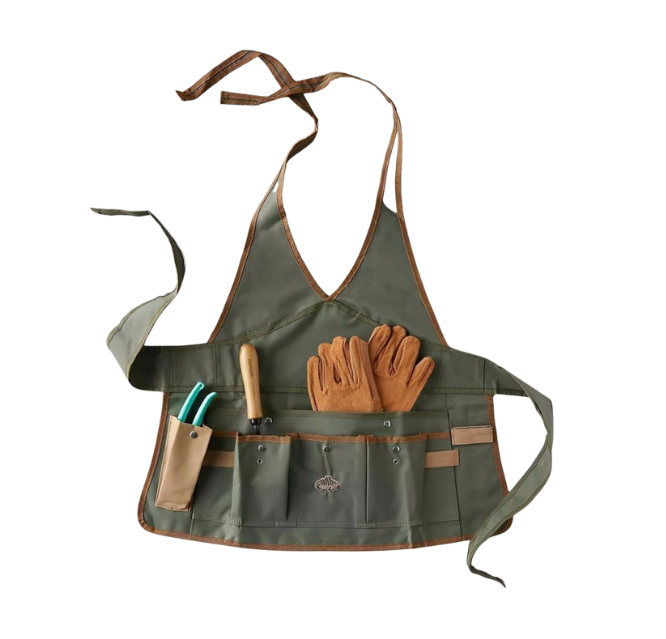 Green gardening apron with tool pockets and gloves on a white background